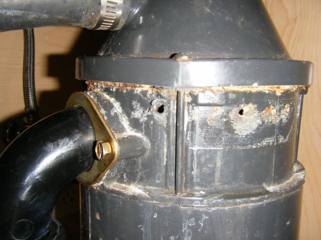Holes in disposal leaking water. Homeowner put duct tape over the holes.